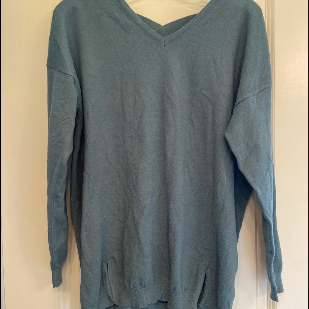 Olive green sweater with cross cross back